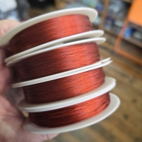 Gecoat staaldraad koraalrood ( 0,38MM )